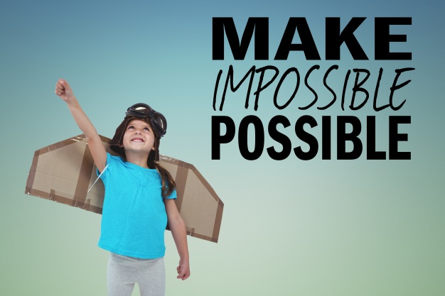 happy-child-with-cardboard-wings-and-inspirational-phrase_1134-508